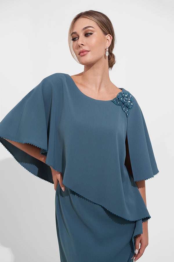 K278021 Elegant Royal Crepe Sheath Gown with Draped Asymmetrical Tunic Cape and Beaded Trim