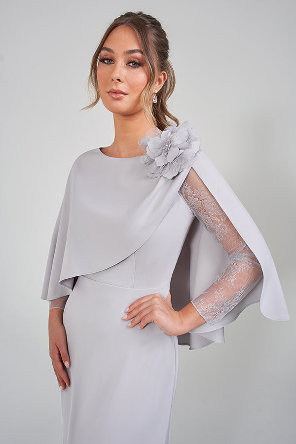 K228006 Luxurious Royal Crepe Sheath Gown with Flowing Cape and Sparkling Beaded Flower