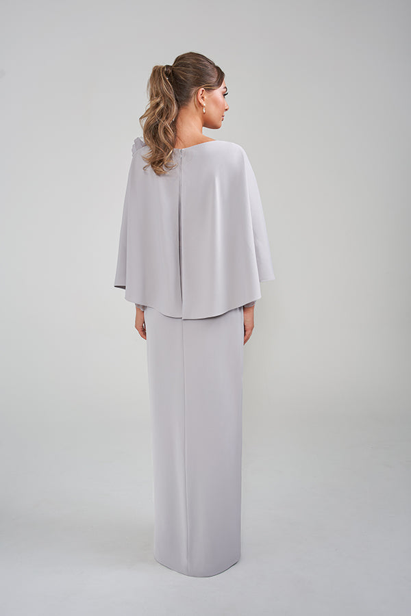 K228006 Luxurious Royal Crepe Sheath Gown with Flowing Cape and Sparkling Beaded Flower